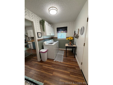This beautifully updated 2-bedroom, 2 1/2-bath home offers an - photo 19