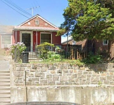 Located on a quiet Bronx block, 2711 Throop Ave puts you right - photo 1