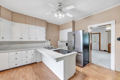 This charming 4-bedroom, 1-bath home is located in a quiet - photo 11