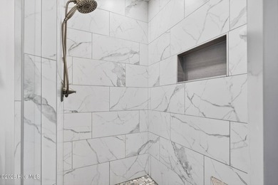 Enjoy the sweeping, unobstructed coastline views from this