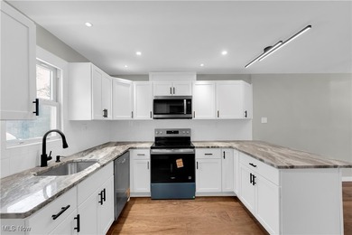 High-End, Move-In Ready Condo in a Highly Sought-After End Unit! - photo 6