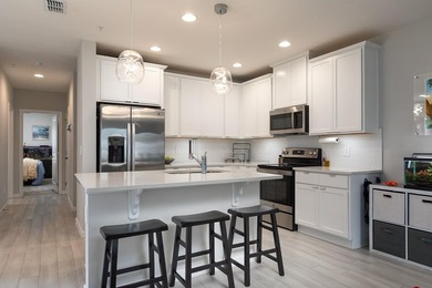 Gorgeous 4-bedroom, 3 full bath End-unit townhome in the gated - photo 7