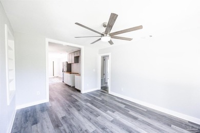 Turnkey and fully renovated! Welcome to 402 Rue Max St., a - photo 3