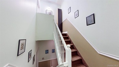 This beautifully maintained legal 3-family semi-detached home - photo 13