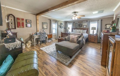 Well-maintained two-bedroom, two-bathroom home situated on two