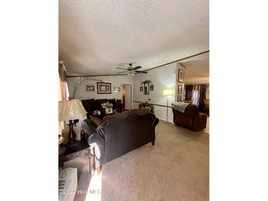 Embrace the beauty of country living with this charming