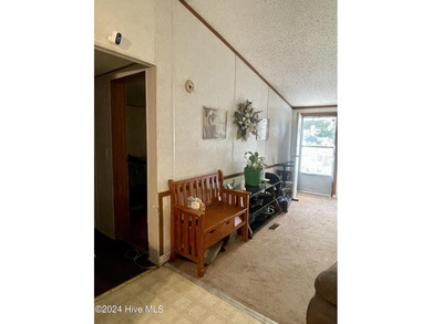 Embrace the beauty of country living with this charming