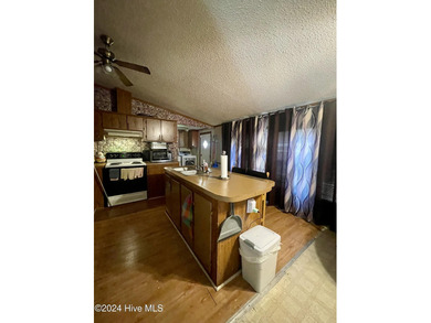 Embrace the beauty of country living with this charming