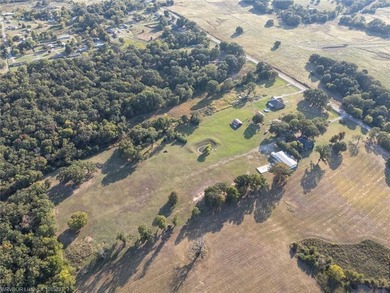 Approximately six acres of beautifully cleared land featuring a - photo 2
