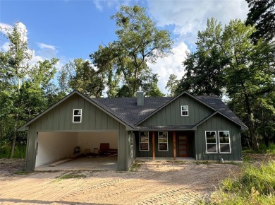 Lake Home For Sale in Scroggins, Texas