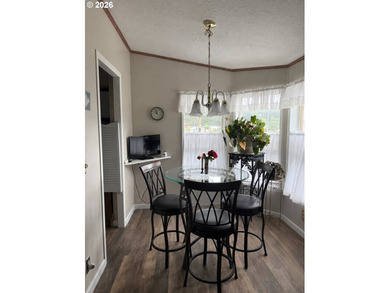 Experience tranquility at Giadanj Lake Estates with this updated - photo 13