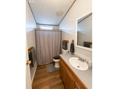 Experience tranquility at Giadanj Lake Estates with this updated - photo 18