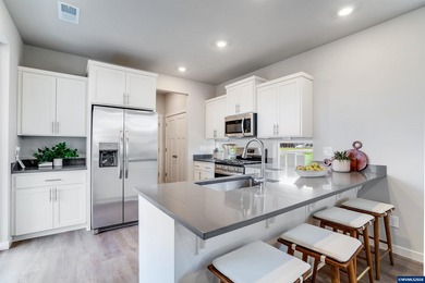 This nearly new two-story home in the sought-after Butternut