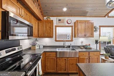 Nestled along a peaceful creek in the gated Sugar Mill Creek at - photo 14
