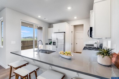 This nearly new two-story home in the sought-after Butternut