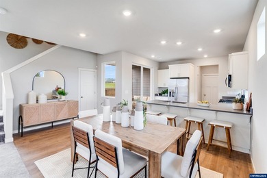 This nearly new two-story home in the sought-after Butternut