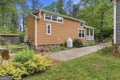 Nestled along a peaceful creek in the gated Sugar Mill Creek at - photo 20