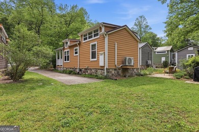 Nestled along a peaceful creek in the gated Sugar Mill Creek at - photo 21