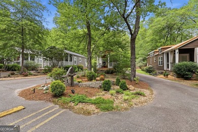 Nestled along a peaceful creek in the gated Sugar Mill Creek at - photo 22