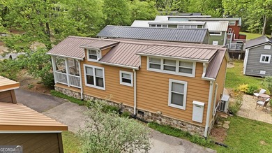 Nestled along a peaceful creek in the gated Sugar Mill Creek at - photo 29