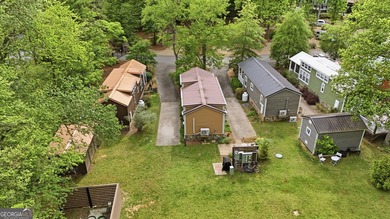 Nestled along a peaceful creek in the gated Sugar Mill Creek at - photo 33
