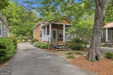 Nestled along a peaceful creek in the gated Sugar Mill Creek at - photo 34
