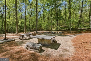 Nestled along a peaceful creek in the gated Sugar Mill Creek at - photo 39