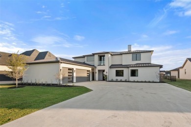 Lake Home For Sale in Pelican Bay, Texas