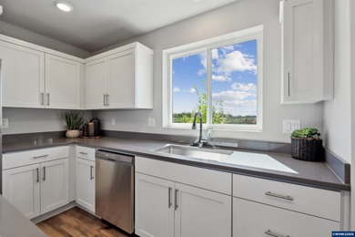 This well-designed two-story home offers an open and inviting