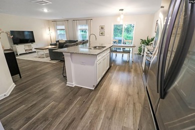 Welcome to Wimbee! This inviting 4-bedroom, 2.5-bath home sits - photo 13