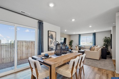 This well-designed two-story home offers an open and inviting