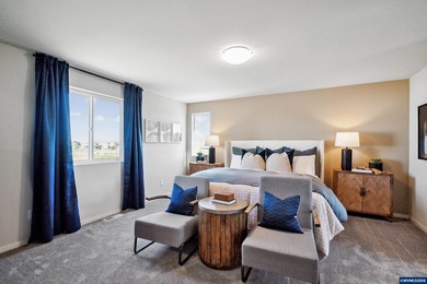 This well-designed two-story home offers an open and inviting