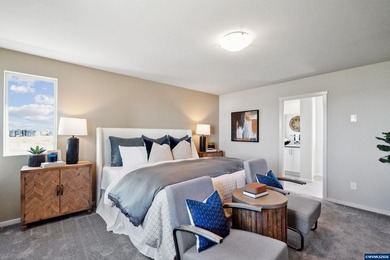 This well-designed two-story home offers an open and inviting