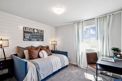 This well-designed two-story home offers an open and inviting