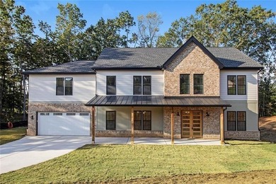 LUXURY NEW CONSTRUCTION IN THE RESERVE CLUB & MARINA AT LAKE - photo 2