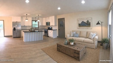 Fresh updates and a modern feel give this renovated 3-bedroom, 1 - photo 3