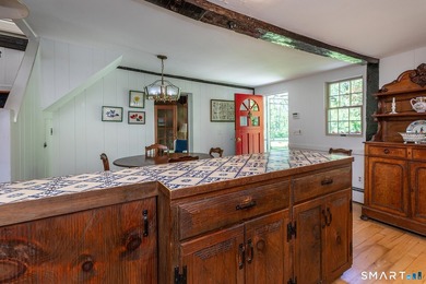 This antique home, originally built in the 1700s, has been - photo 3