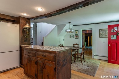 This antique home, originally built in the 1700s, has been - photo 4