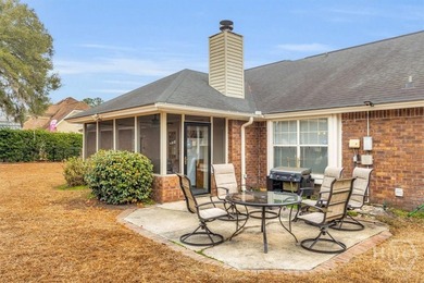 Classic all-brick home perfectly positioned on Hole 1 of the - photo 34