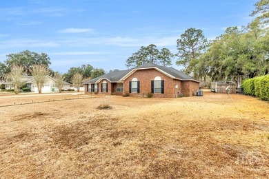 Classic all-brick home perfectly positioned on Hole 1 of the - photo 38