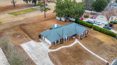 Classic all-brick home perfectly positioned on Hole 1 of the - photo 44