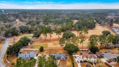 Classic all-brick home perfectly positioned on Hole 1 of the - photo 45