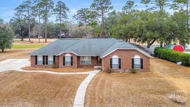 Classic all-brick home perfectly positioned on Hole 1 of the - photo 49
