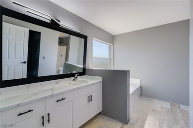 COME CHECK OUT THIS BEAUTIFULLY UPDATED home located in the - photo 11