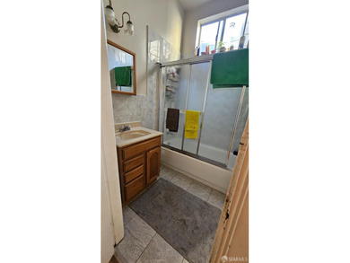 Located between Mission & Valencia Sts. Duplex in the front and - photo 11