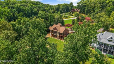 Experience luxury lakefront living in this exceptional 5-bedroom - photo 13