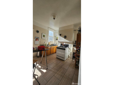 Located between Mission & Valencia Sts. Duplex in the front and - photo 13