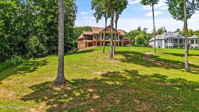 Experience luxury lakefront living in this exceptional 5-bedroom - photo 14