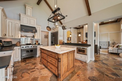 Experience luxury lakefront living in this exceptional 5-bedroom - photo 32