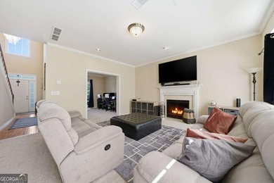 Nestled in the highly sought-after Waters Edge, this traditional - photo 12